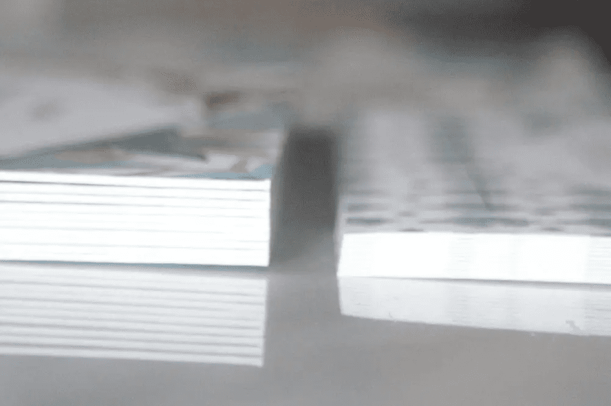 how paper types and thickness can affect wedding invitations cost