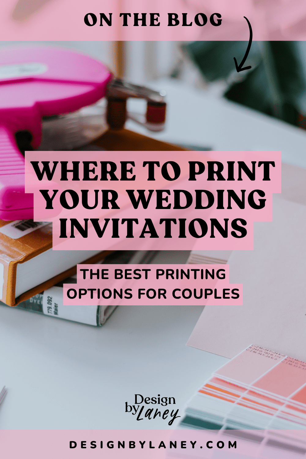 Close-up of stationery tools, an ATG tape gun gluer, and color swatches on a studio desk for the blog post: Where to Print Your Wedding Invitations.